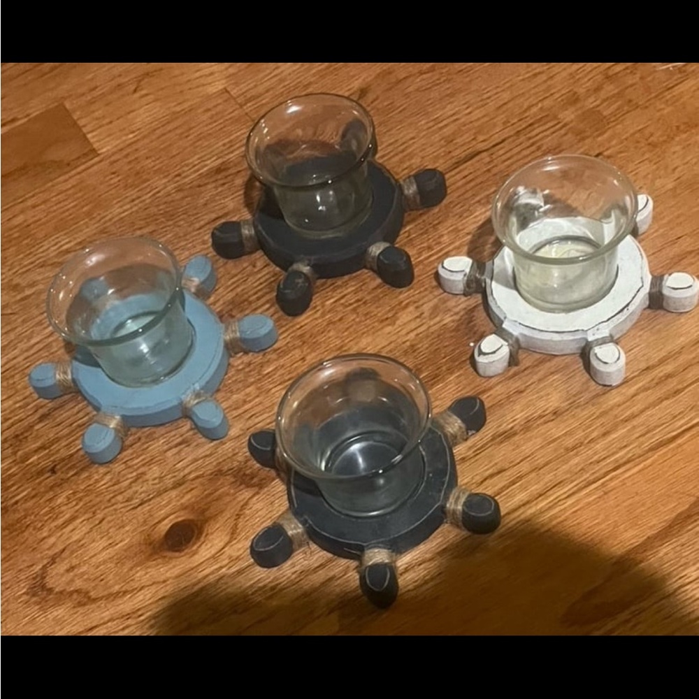 Set of four nautical ship wheel candle holders